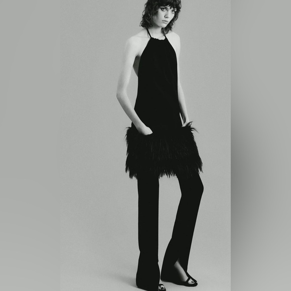 Zarafaux fur hem trim pocketed black sleeveless back out dress size large NWT